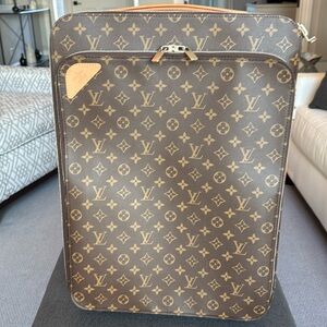 Louis Vuitton Pegase carry-on suitcase M20213